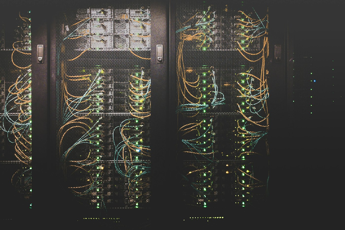Server racks with network cabling in a data hall