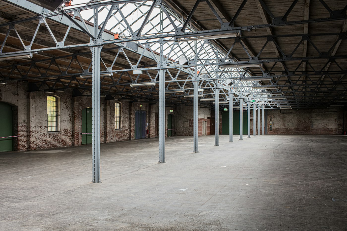 Empty industrial warehouse with steel columns